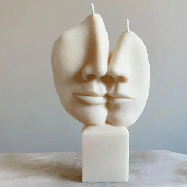 Lovers kiss sculpture candle