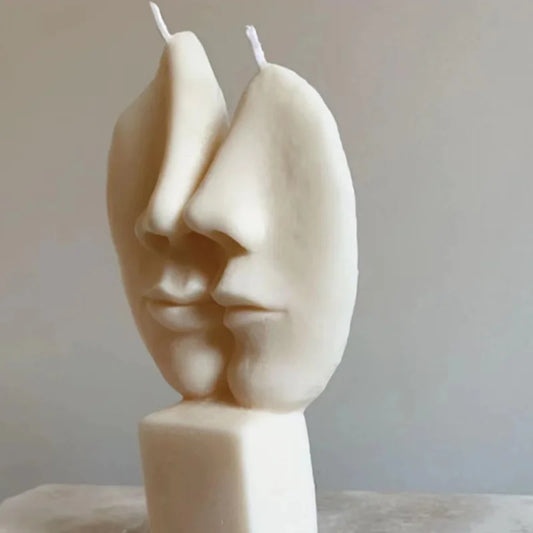 Lovers kiss sculpture candle